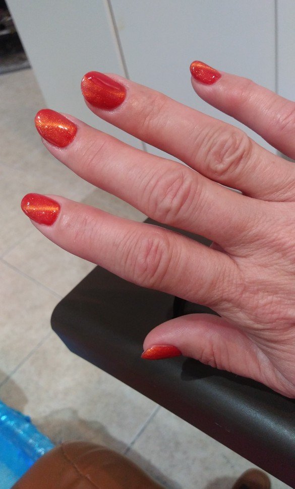 Clean nail salon interior with bright lighting.